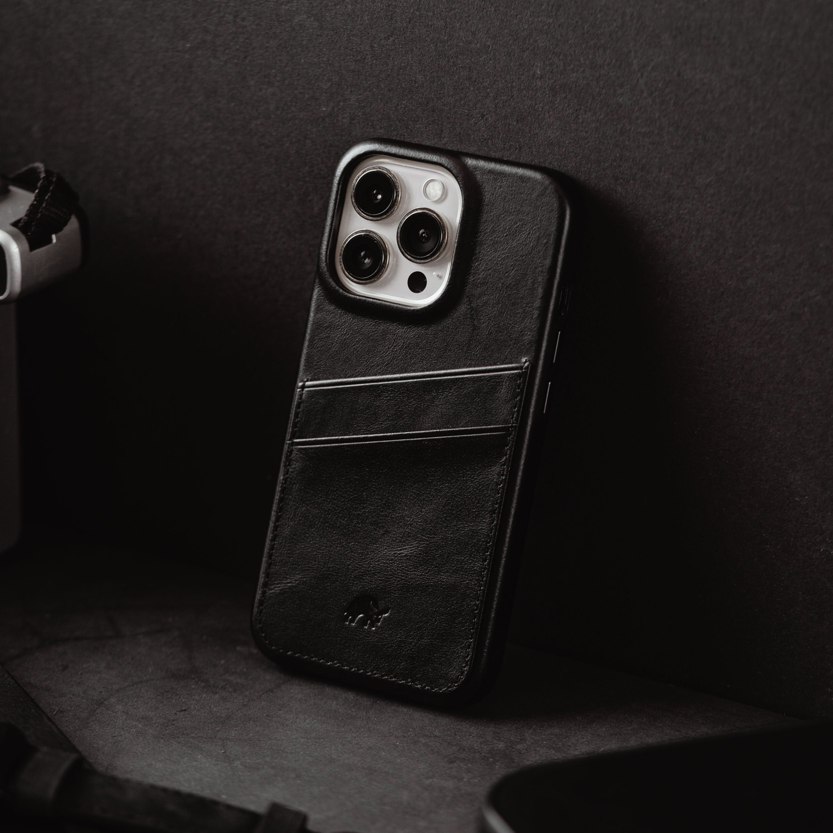 Black leather iPhone case with card slots on the back