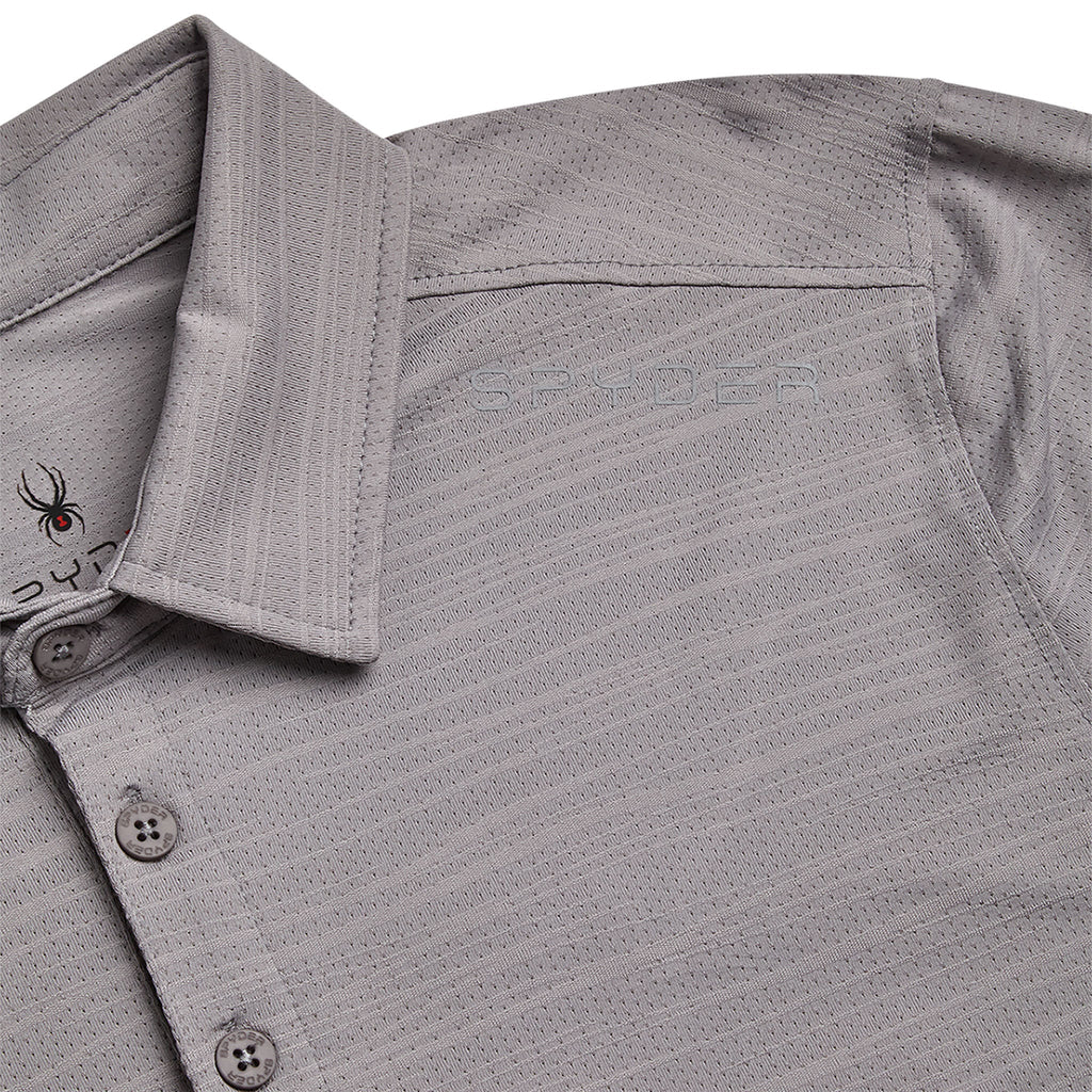 Close-up of a gray polo shirt with collar and buttons on a light gray background